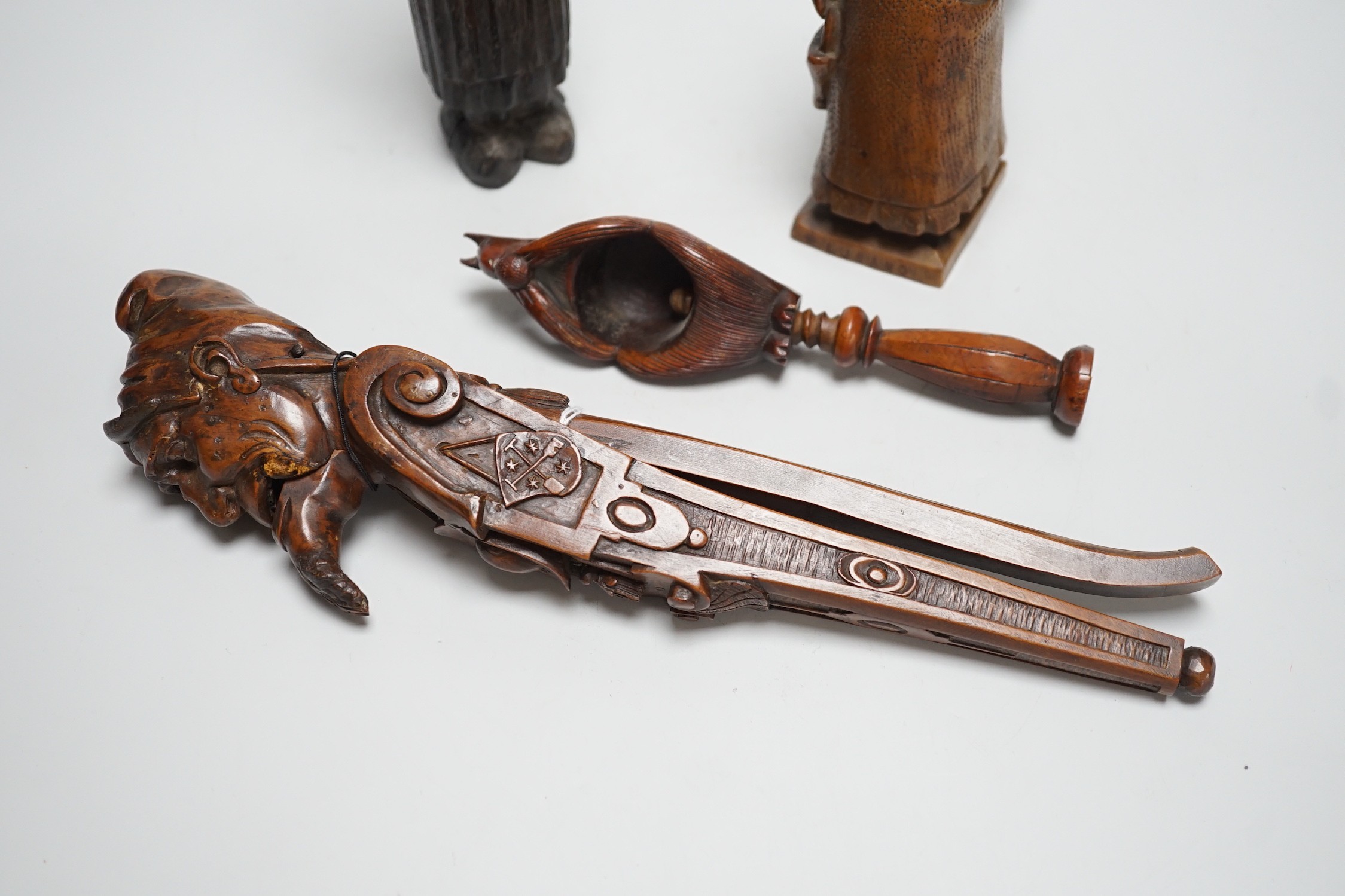 Four late 19th /early 20th century carved wood nutcrackers